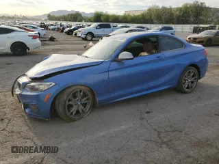2014 BMW 2 Series M235i with VIN WBA1J7C59EVX33852, listed as a Copart auction lot 66116894 with 0 mi miles and Salvage Title. Bid and sale history available at carsss.com. Image 1.