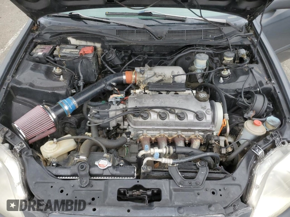 1996 Honda Civic EX z VIN 1HGEJ8146TL091427, wystawiony jako Copart lot #53537235 z przebiegiem 132 490 mil mil oraz Szkoda całkowita • Salvage title. Historia ofert i sprzedaży dostępna na DreamBid. Obrazek 11.