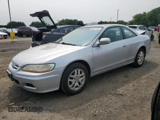 2001 Honda Accord EX z VIN 1HGCG22531A030216, wystawiony jako Copart lot #59487185 z przebiegiem 210 741 mil mil oraz Szkoda całkowita • Salvage title. Historia ofert i sprzedaży dostępna na DreamBid. Obrazek 1.