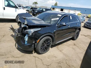 2021 Cadillac XT4 AWD Premium Luxury z VIN 1GYFZDR48MF081095, wystawiony jako Copart lot #54206265 z przebiegiem 60 923 mil mil oraz Tytuł czysty. Historia ofert i sprzedaży dostępna na DreamBid. Obrazek 1.