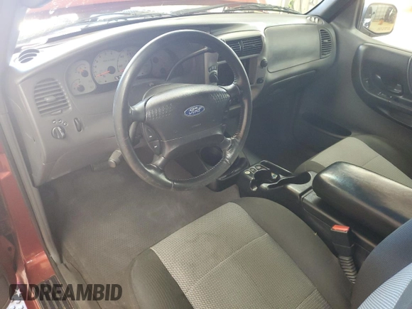 2003 Ford Ranger XL Fleet with VIN 1FTZR45E23PB21049, listed as a Copart auction lot 57033605 with 152,889 mi miles and Salvage title. Bid and sale history available at DreamBid. Image 8.