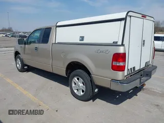 2008 Ford F-150 XLT with VIN 1FTPX14V18KB48289, listed as a IAAI auction lot 42001437 with 184,530 mi miles. Bid and sale history available at carsss.com. Image 3.