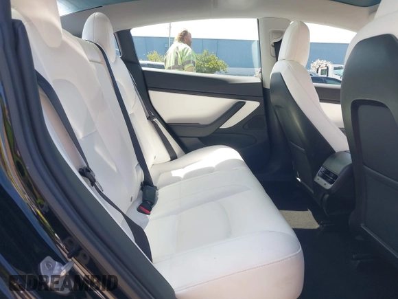 2019 Tesla Model 3 Long Range with VIN 5YJ3E1EB6KF192477, listed as a IAAI auction lot 41981600 with 62,888 mi miles. Bid and sale history available at carsss.com. Image 8.
