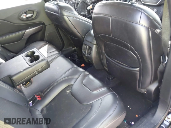 2019 Jeep Cherokee Latitude Plus with VIN 1C4PJLLB0KD358852, listed as a IAAI auction lot 41794999 with 112,667 mi miles. Bid and sale history available at carsss.com. Image 8.