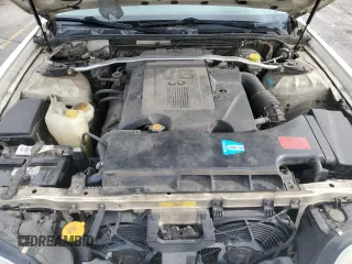 1998 Infiniti Q45 z VIN JNKBY31A8WM403038, wystawiony jako Copart lot #86904484 z przebiegiem 136 142 mil mil oraz Szkoda całkowita • Salvage title. Historia ofert i sprzedaży dostępna na DreamBid. Obrazek 11.