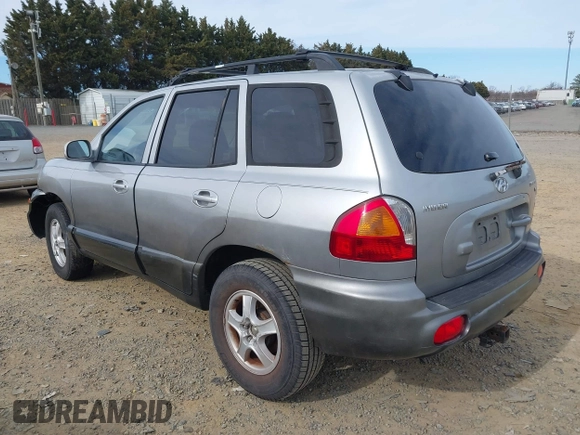 2004 Hyundai Santa Fe GLS with VIN KM8SC13D74U700404, listed as a IAAI auction lot 41735889 with 208,946 mi miles. Bid and sale history available at carsss.com. Image 3.