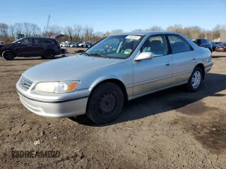 2000 Toyota Camry CE with VIN JT2BG22K0Y0461797, listed as a Copart auction lot 53646765 with 143,315 mi miles and Salvage Title. Bid and sale history available at carsss.com. Image 1.
