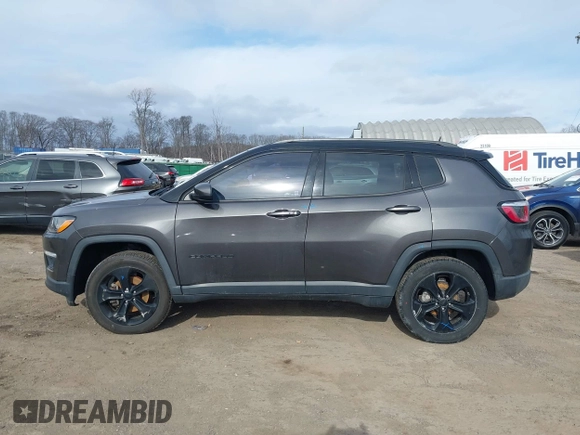 2019 Jeep Compass Latitude with VIN 3C4NJDBB4KT593022, listed as a IAAI auction lot 41627841 with 69,443 mi miles and . Bid and sale history available at DreamBid. Image 14.