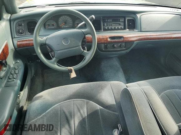 1997 Mercury Grand Marquis GS z VIN 2MELM74W7VX687221, wystawiony jako Copart lot #78665224 z przebiegiem 226 077 mil mil oraz Szkoda całkowita • Salvage title. Historia ofert i sprzedaży dostępna na DreamBid. Obrazek 8.