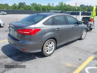 2016 Ford Focus SE with VIN 1FADP3F26GL207417, listed as a IAAI auction lot 42107442 with 116,700 mi miles. Bid and sale history available at carsss.com. Image 4.
