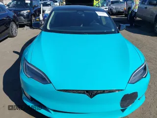 2018 Tesla Model S 75D with VIN 5YJSA1E29JF263418, listed as a IAAI auction lot 41682037 with 84,764 mi miles and . Bid and sale history available at DreamBid. Image 12.