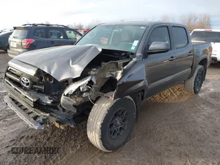 2016 Toyota Tacoma SR5 with VIN 5TFAX5GN1GX056450, listed as a IAAI auction lot 41215339 with 129,604 mi miles. Bid and sale history available at carsss.com. Image 19.