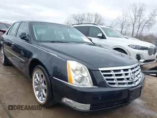 2008 Cadillac DTS 1SC with VIN 1G6KD57Y18U180943, listed as a IAAI auction lot 42031463 with 161,159 mi miles and . Bid and sale history available at carsss.com. Image 1.