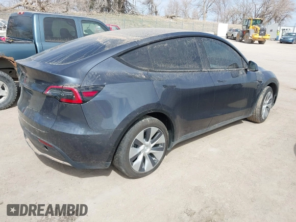 2022 Tesla Model Y Long Range with VIN 7SAYGDEE5NF534259, listed as a IAAI auction lot 41860246 with 24,513 mi miles and . Bid and sale history available at carsss.com. Image 4.