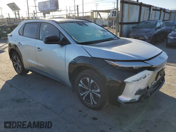 2023 Toyota bZ4X XLE with VIN JTMAAAAA8PA015784, listed as a Copart auction lot 56072755 with 21,387 mi miles and Salvage Title. Bid and sale history available at DreamBid. Image 4.