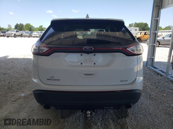 2016 Ford Edge SE с VIN 2FMPK3G91GBC63505, выставлен на аукционе Copart как лот 61766975 с пробегом 124 082 миль миль и Чистый • Clean title. История ставок и продаж доступна на DreamBid. Изображение 6.