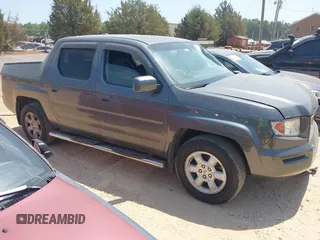 2007 Honda Ridgeline RTL z VIN 2HJYK16527H503343, wystawiony jako IAAI lot #42167184 z przebiegiem 292 409 mil mil oraz . Historia ofert i sprzedaży dostępna na DreamBid. Obrazek 1.
