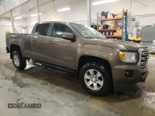2015 GMC Canyon 4WD SLE z VIN 1GTG6BE3XF1242163, wystawiony jako Copart lot #57132035 z przebiegiem 110 241 mil mil oraz Szkoda całkowita • Salvage title. Historia ofert i sprzedaży dostępna na DreamBid. Obrazek 4.