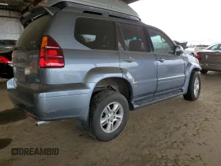 2005 Lexus GX 470 with VIN JTJBT20XX50073695, listed as a Copart auction lot 50595385 with 162,617 mi miles and Salvage Title. Bid and sale history available at carsss.com. Image 3.