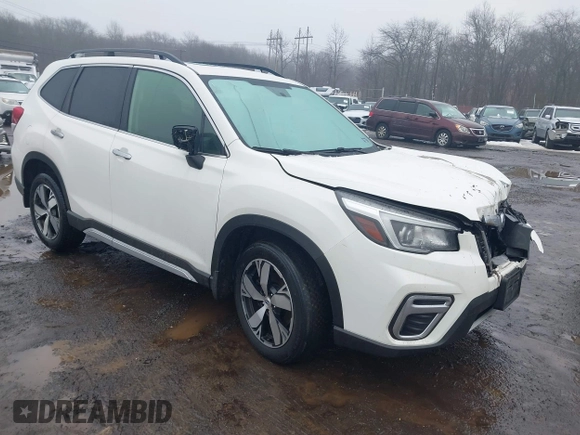 2019 Subaru Forester Touring with VIN JF2SKAWC3KH555900, listed as a IAAI auction lot 41558281 with 138,351 mi miles. Bid and sale history available at carsss.com. Image 1.