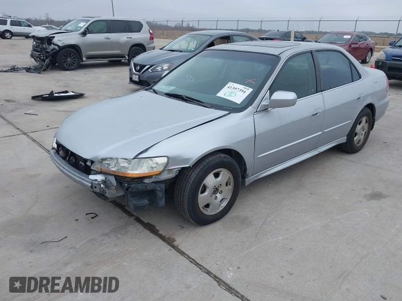 2001 Honda Accord EX z VIN 1HGCG16571A078287, wystawiony jako IAAI lot #41397391 z przebiegiem 238 239 mil mil oraz . Historia ofert i sprzedaży dostępna na DreamBid. Obrazek 2.