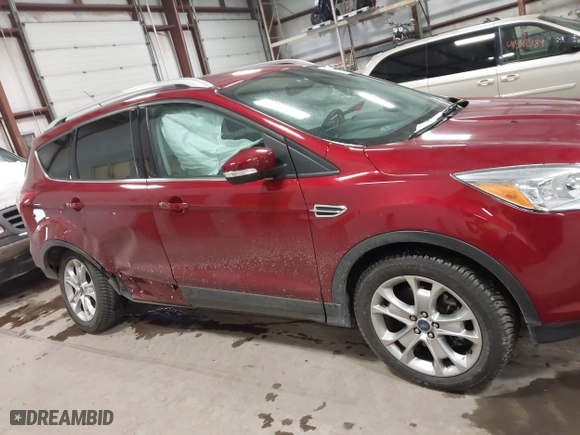 2014 Ford Escape Titanium with VIN 1FMCU9J9XEUA51732, listed as a IAAI auction lot 41542867 with 44,141 mi miles. Bid and sale history available at carsss.com. Image 13.