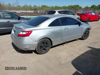 2007 Honda Civic Cpe EX with VIN 2HGFG128X7H547623, listed as a IAAI auction lot 42033010 with 228,518 mi miles. Bid and sale history available at carsss.com. Image 4.