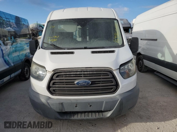 2016 Ford Transit Cargo with VIN 1FTYR1CM4GKB38734, listed as a Copart auction lot 76486004 with Not Provided miles and Salvage Title. Bid and sale history available at DreamBid. Image 5.