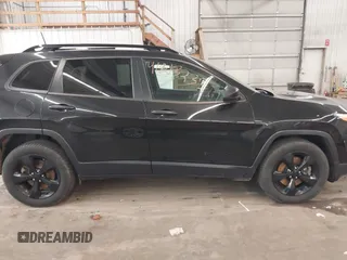 2016 Jeep Cherokee Sport with VIN 1C4PJMAB3GW375360, listed as a IAAI auction lot 41813233 with 100,780 mi miles and . Bid and sale history available at DreamBid. Image 14.