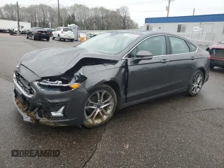 2020 Ford Fusion Titanium with VIN 3FA6P0RU8LR157460, listed as a Copart auction lot 54742885 with 104,751 mi miles and Salvage title. Bid and sale history available at DreamBid. Image 1.