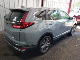 2020 Honda CR-V Touring z VIN 2HKRW2H90LH608435, wystawiony jako IAAI lot #42318256 z przebiegiem 32 602 mil mil oraz . Historia ofert i sprzedaży dostępna na DreamBid. Obrazek 4.