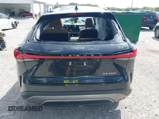 2023 Lexus RX with VIN JTJCHMAAXP2001561, listed as a IAAI auction lot 40850514 with 1 mi miles. Bid and sale history available at carsss.com. Image 16.