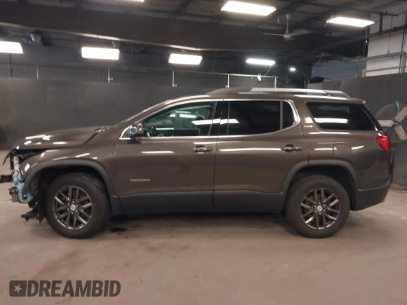 2019 GMC Acadia SLT with VIN 1GKKNMLS1KZ289312, listed as a IAAI auction lot 42123763 with 76,352 mi miles and . Bid and sale history available at DreamBid. Image 14.