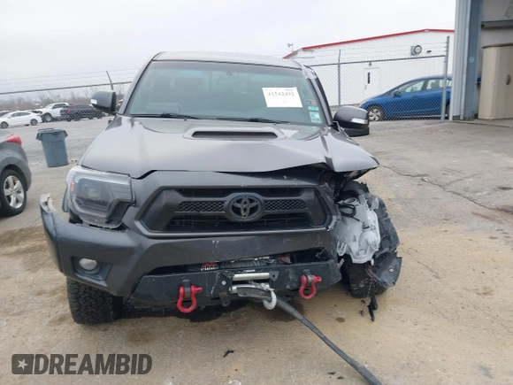 2014 Toyota Tacoma z VIN 3TMMU4FN9EM066292, wystawiony jako IAAI lot #41542492 z przebiegiem 122 308 mil mil oraz . Historia ofert i sprzedaży dostępna na DreamBid. Obrazek 11.