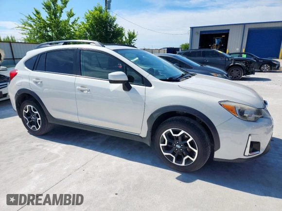 2016 Subaru Crosstrek Premium with VIN JF2GPABC1G8315300, listed as a Copart auction lot 60120335 with 104,668 mi miles and Salvage title. Bid and sale history available at DreamBid. Image 4.