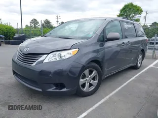 2015 Toyota Sienna LE AAS with VIN 5TDKK3DC5FS610247, listed as a IAAI auction lot 42033460 with 260,962 mi miles and . Bid and sale history available at DreamBid. Image 2.