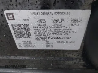 2021 Chevrolet Traverse LS z VIN 1GNERFKW3MJ198757, wystawiony jako IAAI lot #41974050 z przebiegiem 95 097 mil mil oraz . Historia ofert i sprzedaży dostępna na DreamBid. Obrazek 9.