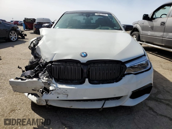 2018 BMW 5 Series M550i xDrive with VIN WBAJB9C54JB287422, listed as a Copart auction lot 46017034 with Not provided miles and Salvage title. Bid and sale history available at DreamBid. Image 5.
