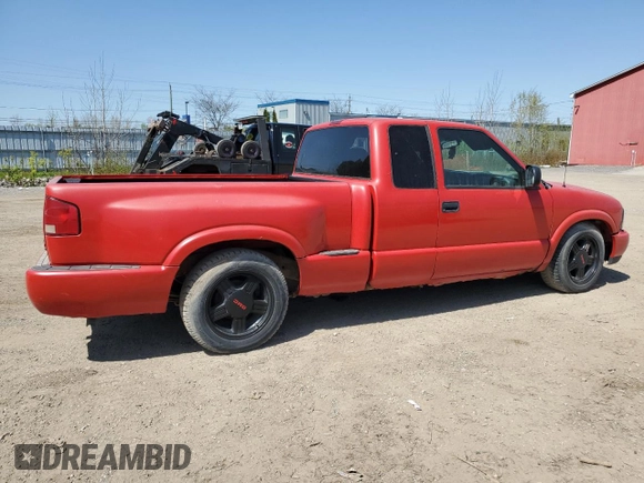 2000 GMC Sonoma SLS z VIN 1GTCS19W0Y8262960, wystawiony jako Copart lot #56512435 z przebiegiem 243 662 mil mil oraz Tytuł czysty. Historia ofert i sprzedaży dostępna na DreamBid. Obrazek 3.