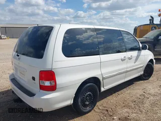 2005 Kia Sedona LX with VIN KNDUP131456634276, listed as a IAAI auction lot 42090209 with 185,754 mi miles and . Bid and sale history available at DreamBid. Image 4.