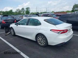 2019 Toyota Camry LE with VIN 4T1B11HK2KU743445, listed as a IAAI auction lot 42129688 with 284,938 mi miles and . Bid and sale history available at DreamBid. Image 3.