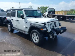 2023 Jeep Wrangler Willys with VIN 1C4HJXDG5PW566145, listed as a IAAI auction lot 41912872 with 50,290 mi miles and . Bid and sale history available at DreamBid. Image 1.
