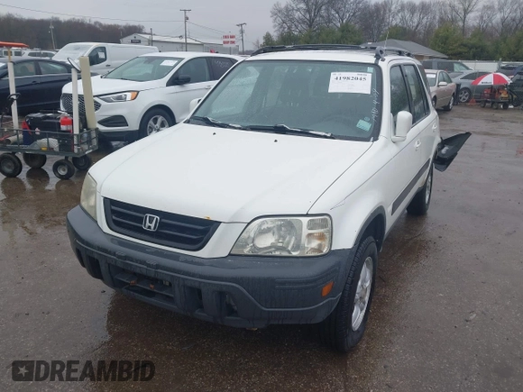 2001 Honda CR-V EX with VIN JHLRD18611C035126, listed as a IAAI auction lot 41982045 with 265,360 mi miles and . Bid and sale history available at DreamBid. Image 2.
