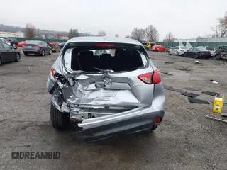 2016 Mazda CX-5 Grand Touring with VIN JM3KE4DY4G0712465, listed as a IAAI auction lot 41859217 with 61,806 mi miles and . Bid and sale history available at carsss.com. Image 17.