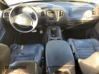 2002 Ford F-150 Harley Davidson with VIN 1FTRW07332KE04049, listed as a Copart auction lot 84742654 with 287,346 mi miles and Salvage Title. Bid and sale history available at carsss.com. Image 8.