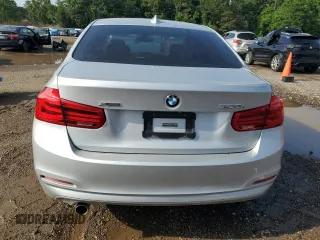 2018 BMW 3 Series 320i xDrive with VIN WBA8E5G52JNV02982, listed as a Copart auction lot 60742155 with 54,469 mi miles and Salvage title. Bid and sale history available at DreamBid. Image 6.
