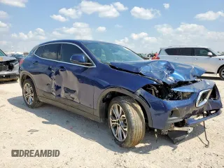 2020 BMW X2 sDrive28i with VIN WBXYH9C0XL5P59325, listed as a Copart auction lot 57661505 with 49,551 mi miles and Salvage title. Bid and sale history available at DreamBid. Image 4.