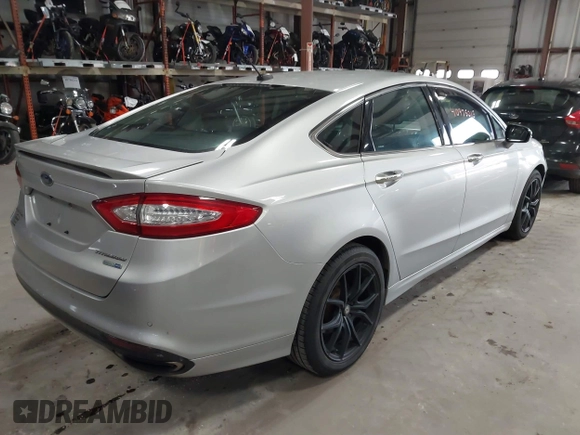 2015 Ford Fusion Titanium with VIN 3FA6P0D90FR201393, listed as a IAAI auction lot 40975015 with 131,641 mi miles. Bid and sale history available at carsss.com. Image 4.