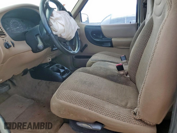 1999 Ford Ranger XL with VIN 1FTYR14VXXPA72216, listed as a Copart auction lot 61868295 with 230,074 mi miles and Salvage title. Bid and sale history available at DreamBid. Image 7.