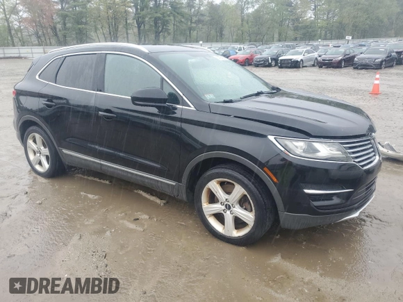 2015 Lincoln MKC with VIN 5LMCJ2A92FUJ22517, listed as a Copart auction lot 55809485 with 185,536 mi miles and Clean Title. Bid and sale history available at DreamBid. Image 4.